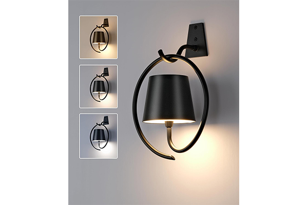 How does the installation position and angle of atmosphere wall light affect the light and shadow effects of the space?